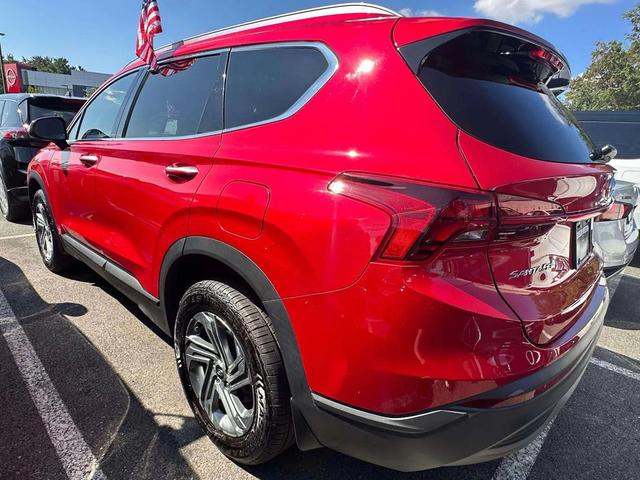 Photo of 2023 Calypso Red Hyundai SANTA FE