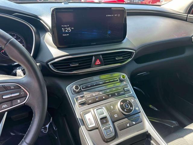 Photo of 2023 Calypso Red Hyundai SANTA FE