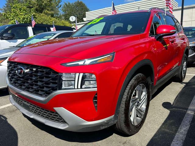 Photo of 2023 Calypso Red Hyundai SANTA FE