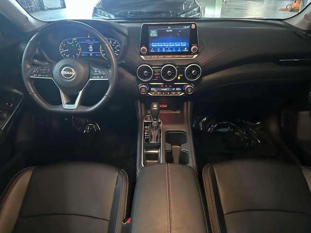 Photo of 2024 Aspen White Tricoat Nissan Sentra
