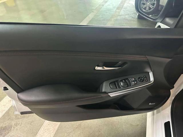 Photo of 2024 Aspen White Tricoat Nissan Sentra