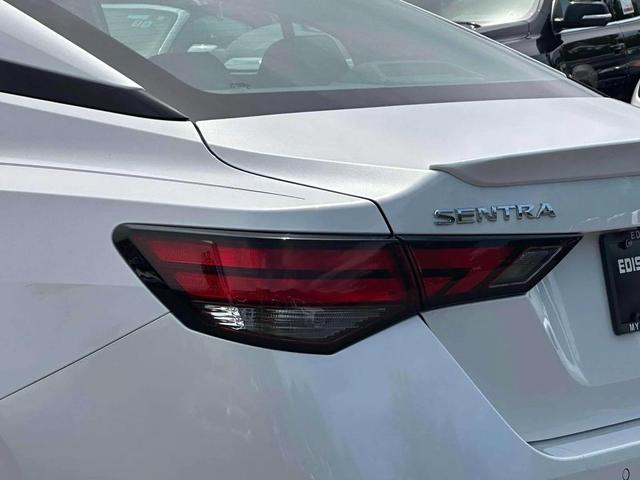 Photo of 2024 Aspen White Tricoat Nissan Sentra