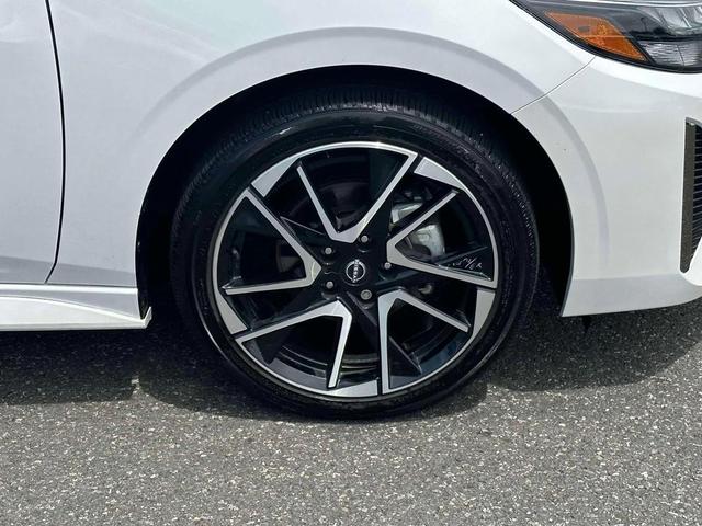 Photo of 2024 Aspen White Tricoat Nissan Sentra
