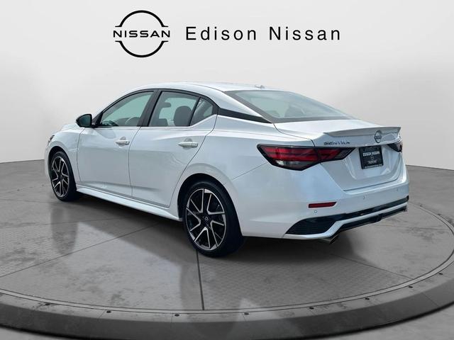 Photo of 2024 Aspen White Tricoat Nissan Sentra