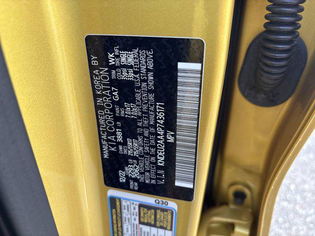 Photo of 2023 Starbright Yellow/Black Roof Kia Seltos