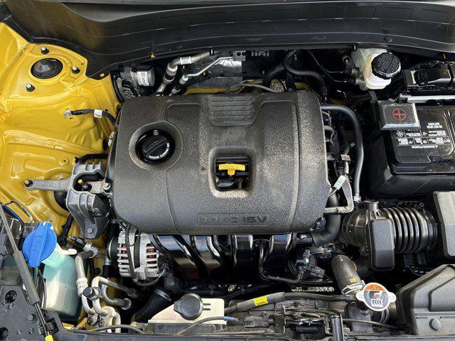 Photo of 2023 Starbright Yellow/Black Roof Kia Seltos