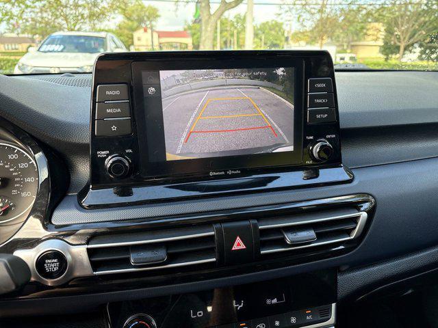 Photo of 2023 Starbright Yellow/Black Roof Kia Seltos