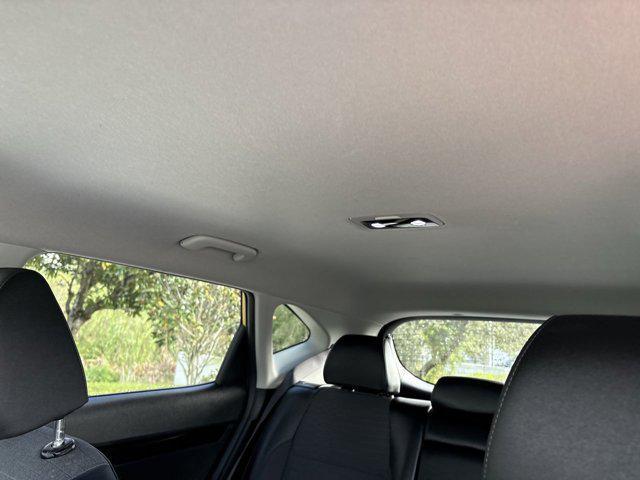Photo of 2023 Starbright Yellow/Black Roof Kia Seltos