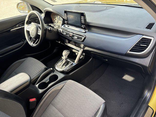 Photo of 2023 Starbright Yellow/Black Roof Kia Seltos