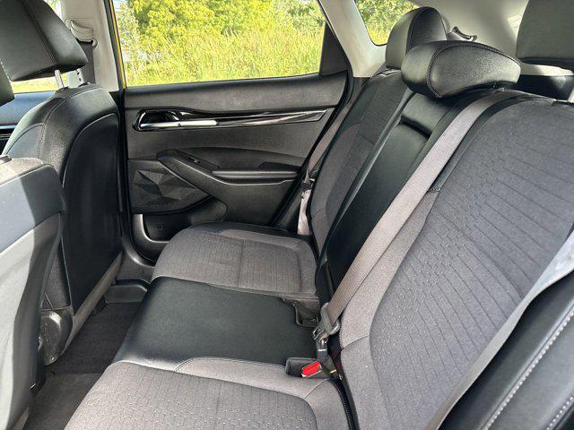 Photo of 2023 Starbright Yellow/Black Roof Kia Seltos
