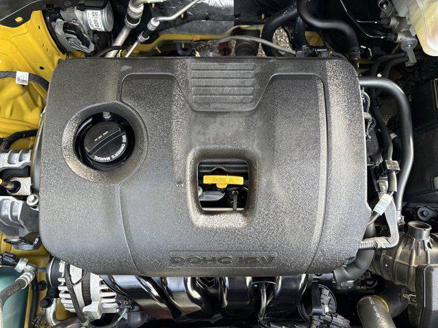 Photo of 2023 Starbright Yellow/Black Roof Kia Seltos