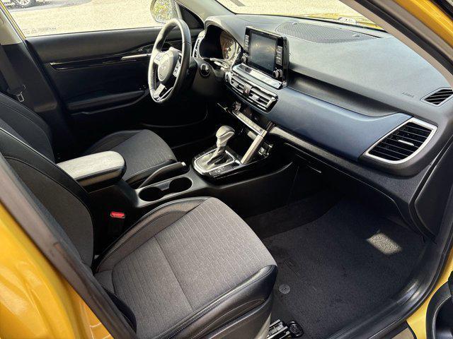 Photo of 2023 Starbright Yellow/Black Roof Kia Seltos