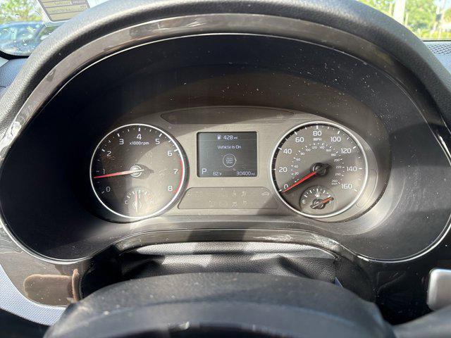 Photo of 2023 Starbright Yellow/Black Roof Kia Seltos