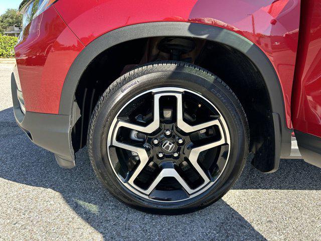 Photo of 2023 Radiant Red Metallic II Honda Passport