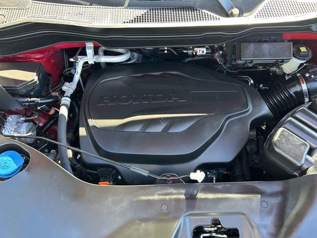 Photo of 2023 Radiant Red Metallic II Honda Passport
