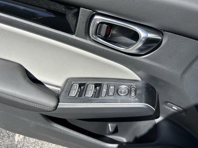 Photo of 2025 Platinum White Pearl Honda Civic Hybrid