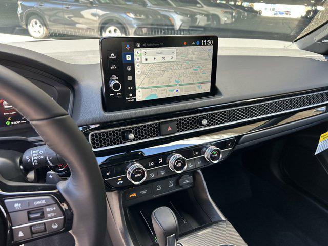 Photo of 2025 Platinum White Pearl Honda Civic Hybrid