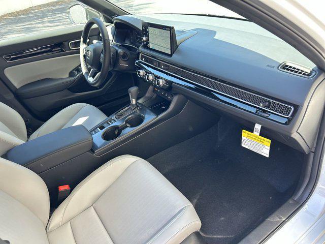 Photo of 2025 Platinum White Pearl Honda Civic Hybrid