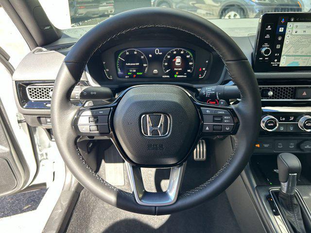 Photo of 2025 Platinum White Pearl Honda Civic Hybrid