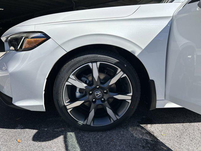 Photo of 2025 Platinum White Pearl Honda Civic Hybrid