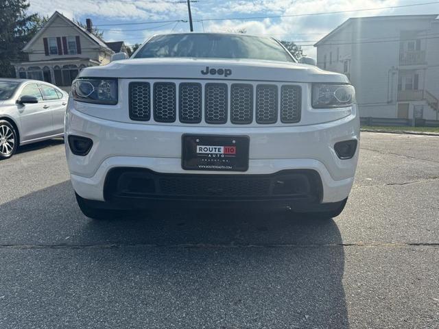 Photo of 2014 Bright White Clearcoat Jeep Grand Cherokee