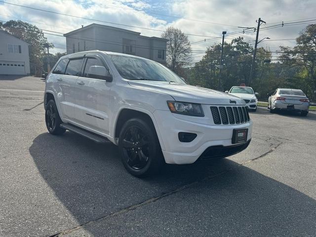 Photo of 2014 Bright White Clearcoat Jeep Grand Cherokee