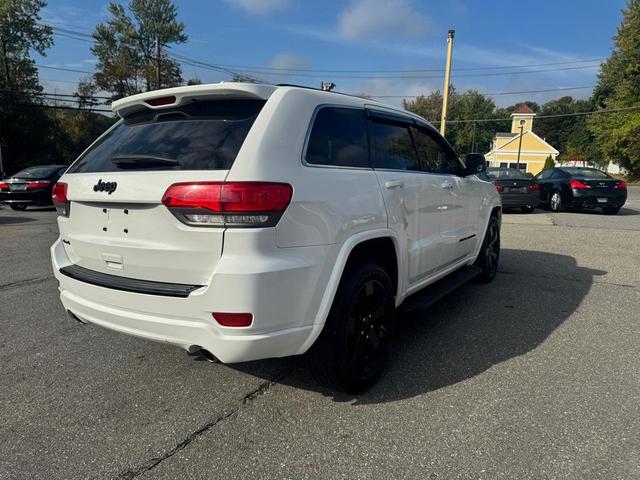 Photo of 2014 Bright White Clearcoat Jeep Grand Cherokee