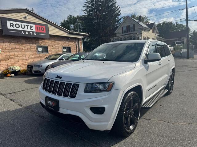 Photo of 2014 Bright White Clearcoat Jeep Grand Cherokee