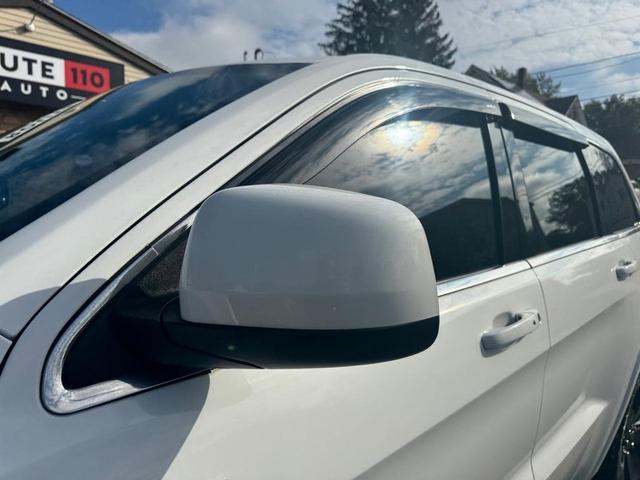 Photo of 2014 Bright White Clearcoat Jeep Grand Cherokee