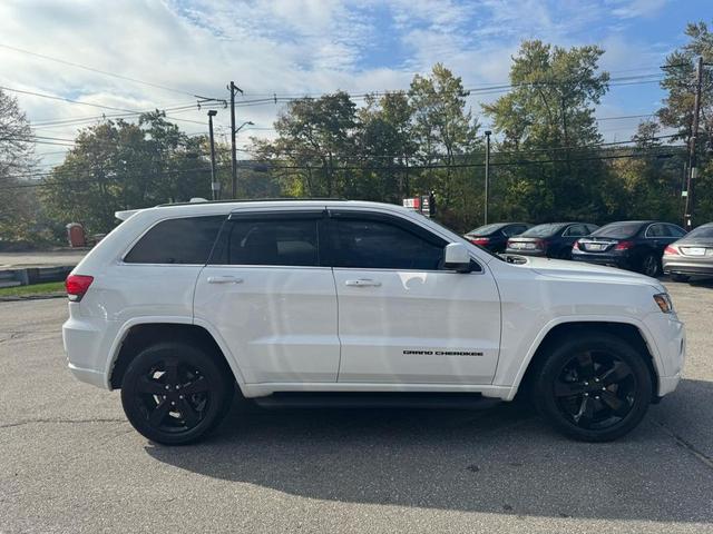 Photo of 2014 Bright White Clearcoat Jeep Grand Cherokee