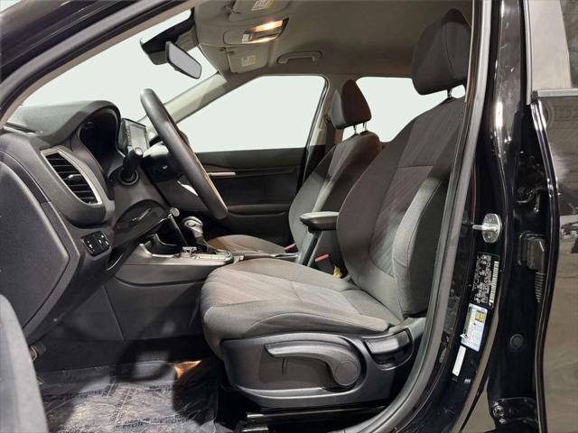 Photo of 2022 Cherry Black Kia Seltos