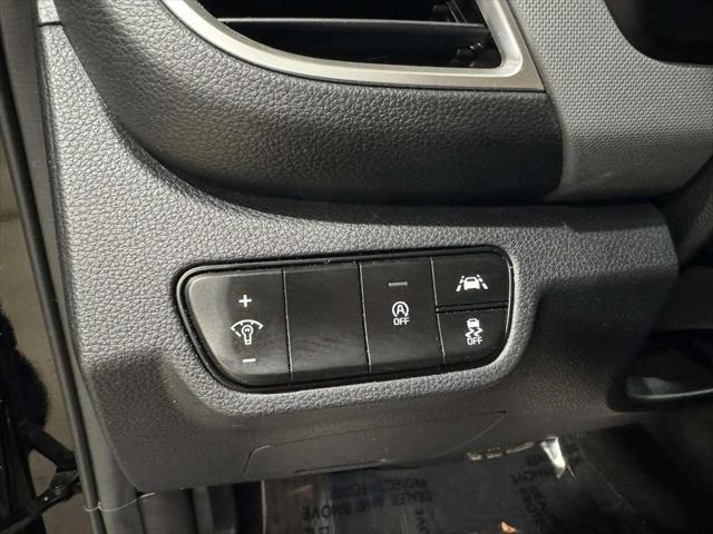 Photo of 2022 Cherry Black Kia Seltos
