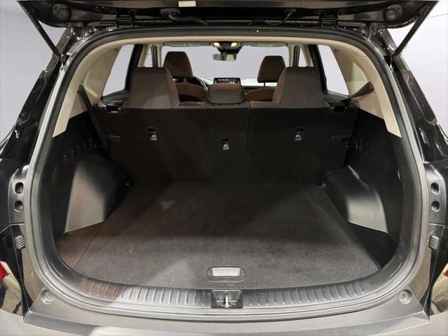 Photo of 2022 Cherry Black Kia Seltos