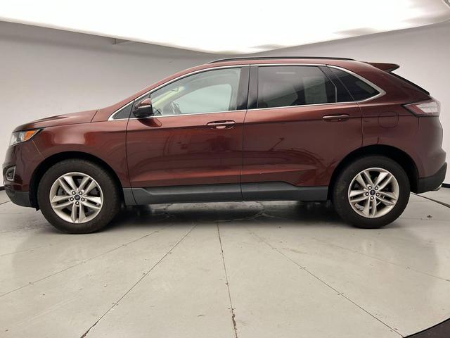 Photo of 2016 BRONZE FIRE MET TINTED CC Ford Edge