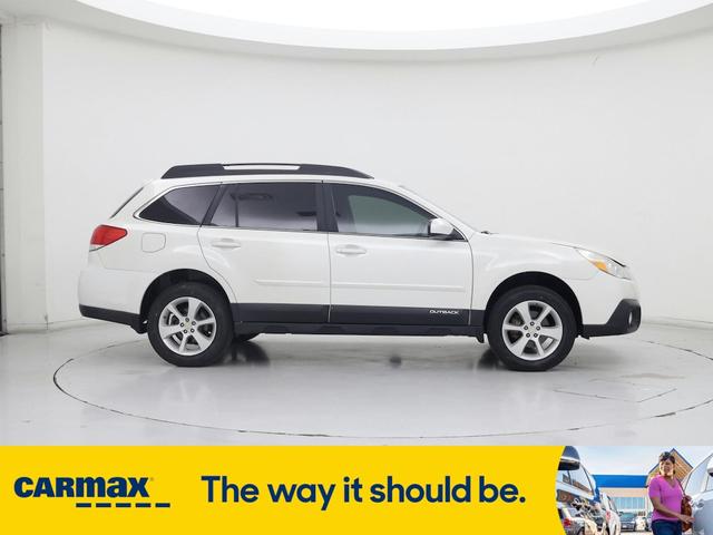Photo of 2014 White Subaru Outback