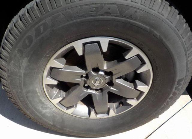 Photo of 2020 Magnetic Black Pearl Nissan Frontier