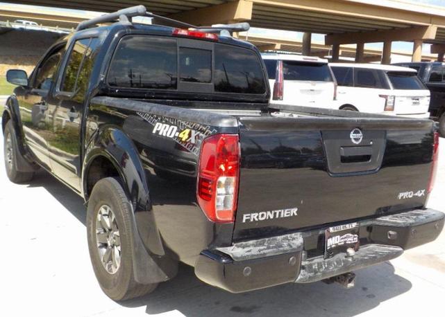 Photo of 2020 Magnetic Black Pearl Nissan Frontier