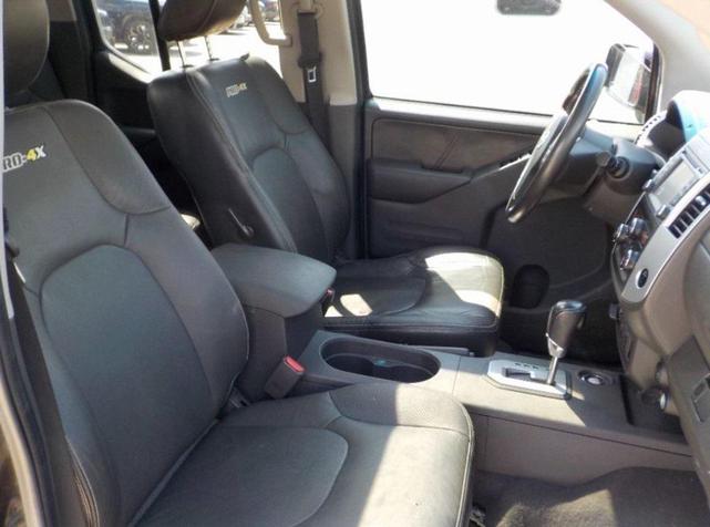 Photo of 2020 Magnetic Black Pearl Nissan Frontier