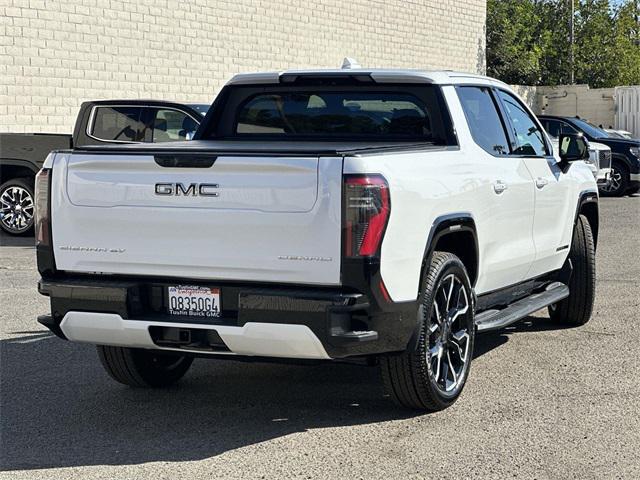 Photo of 2025 Summit White GMC Sierra EV