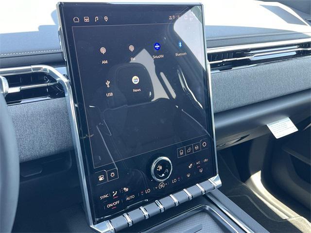 Photo of 2026 Summit White GMC Sierra EV