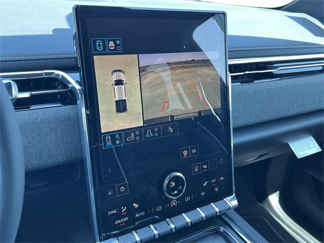 Photo of 2026 Summit White GMC Sierra EV