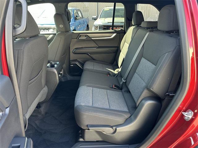 Photo of 2025 Volcanic Red Tintcoat GMC Acadia