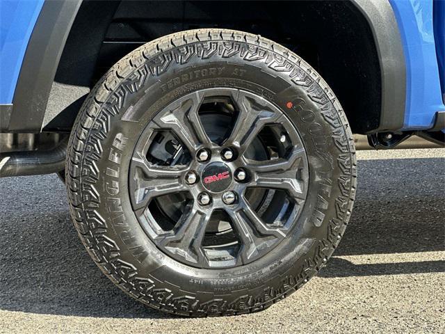 Photo of 2025 Rapids Metallic GMC Canyon