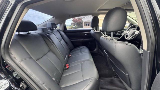 Photo of 2016 Super Black Nissan Altima