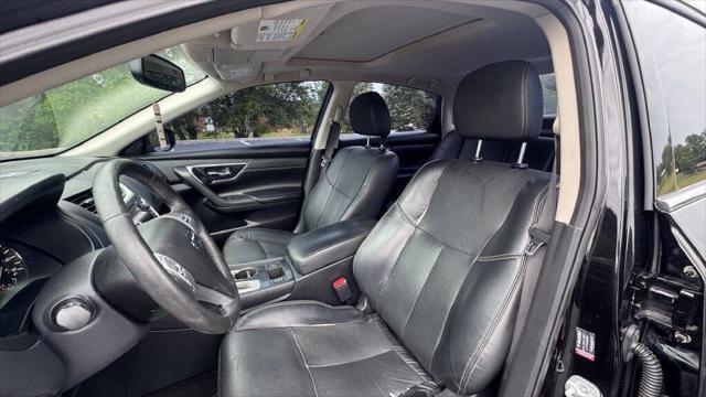 Photo of 2016 Super Black Nissan Altima