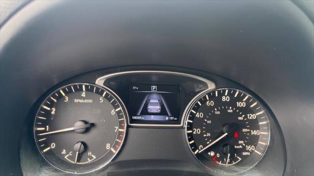 Photo of 2016 Super Black Nissan Altima