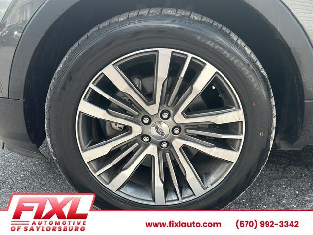 Photo of 2016 Magnetic Metallic Ford Explorer