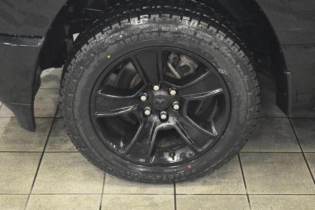 Photo of 2021 Diamond Black Crystal Pearlcoat RAM 1500