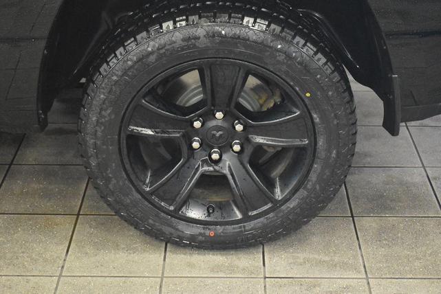Photo of 2021 Diamond Black Crystal Pearlcoat RAM 1500