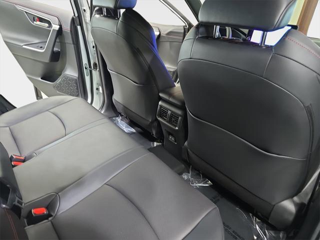 Photo of 2025 Wind Chill Pearl/Midnight Black Metallic Toyota RAV4 Hybrid